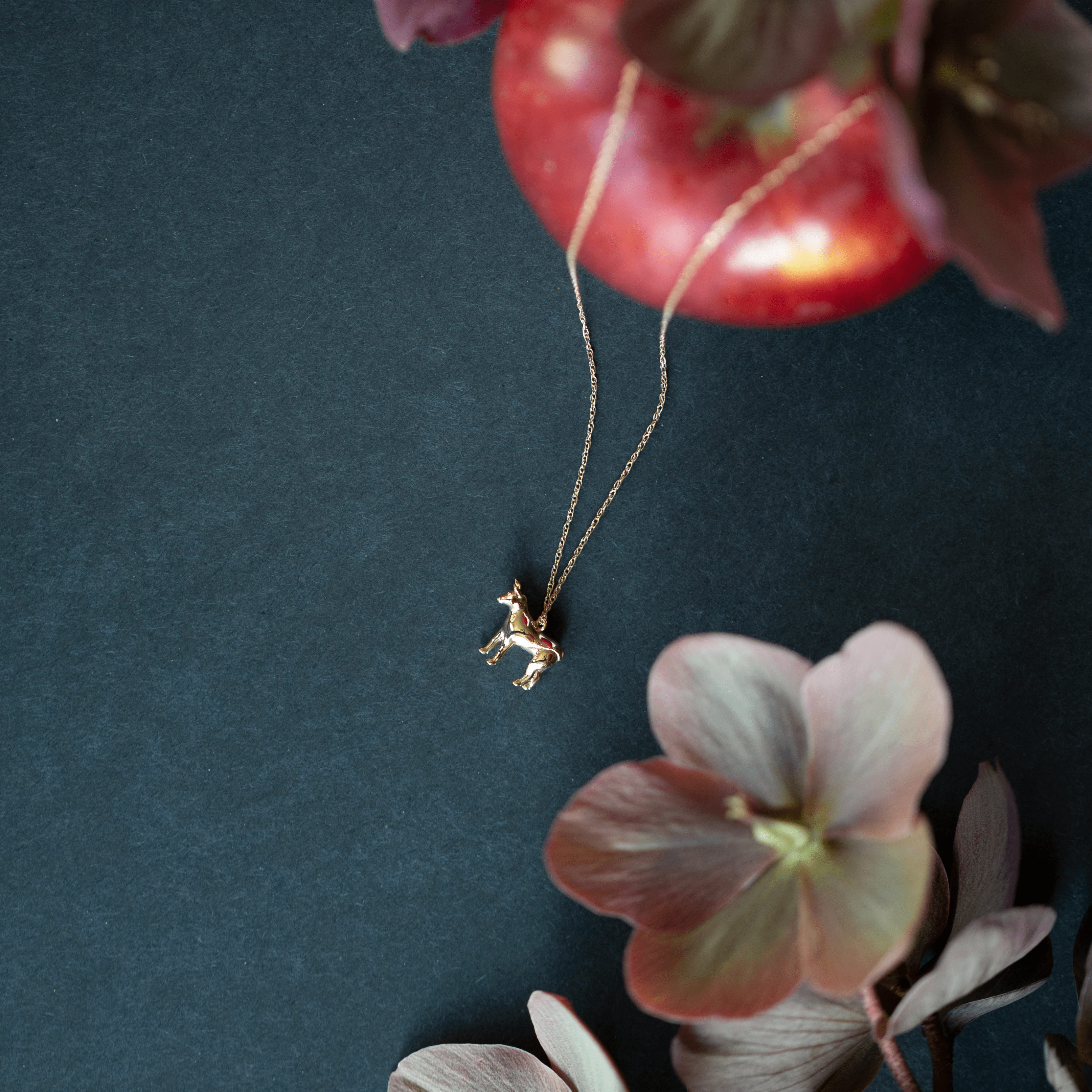 14K yellow gold ox pendant necklace with fair trade African ruby
