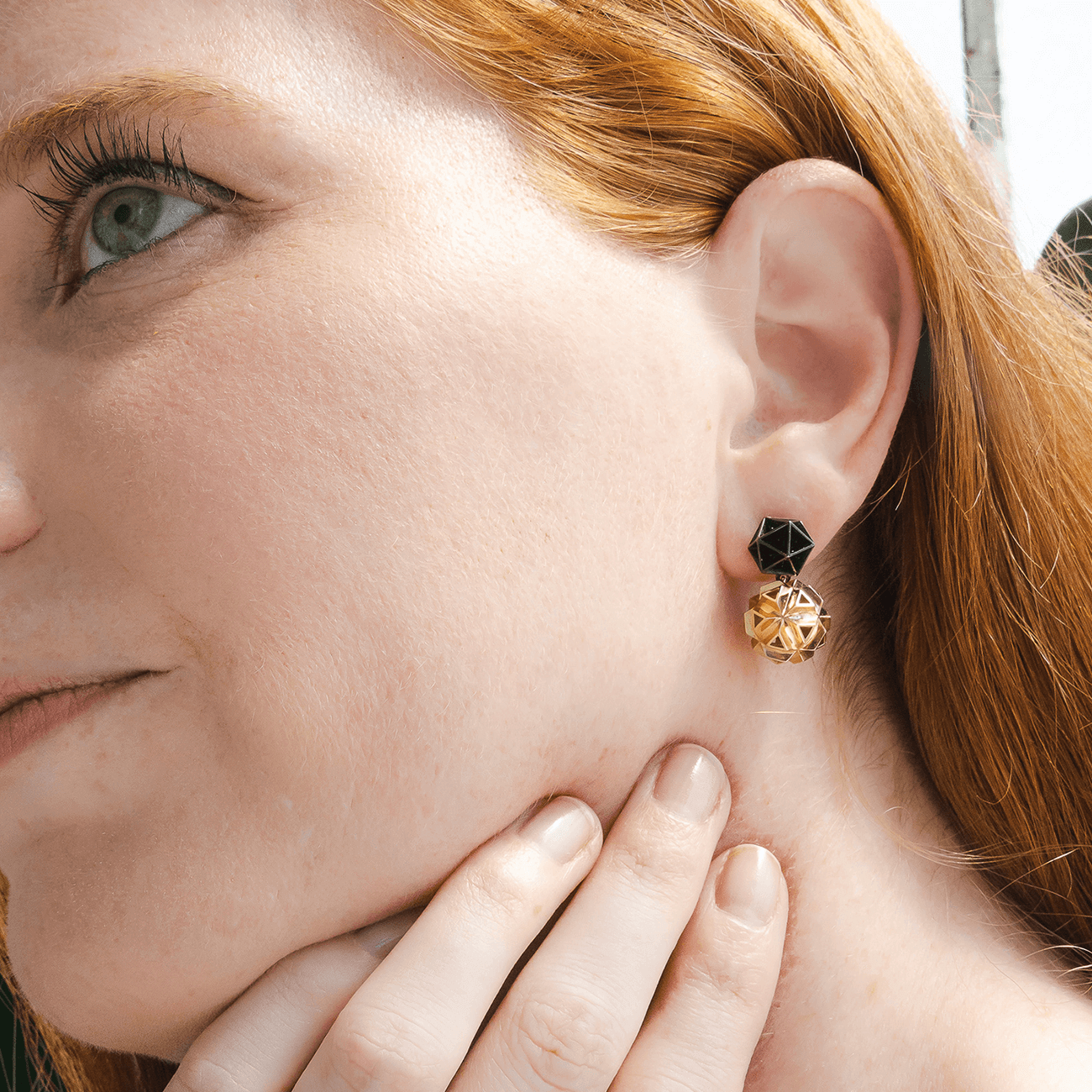 14K yellow gold earrings rhodium fine jewelry on model