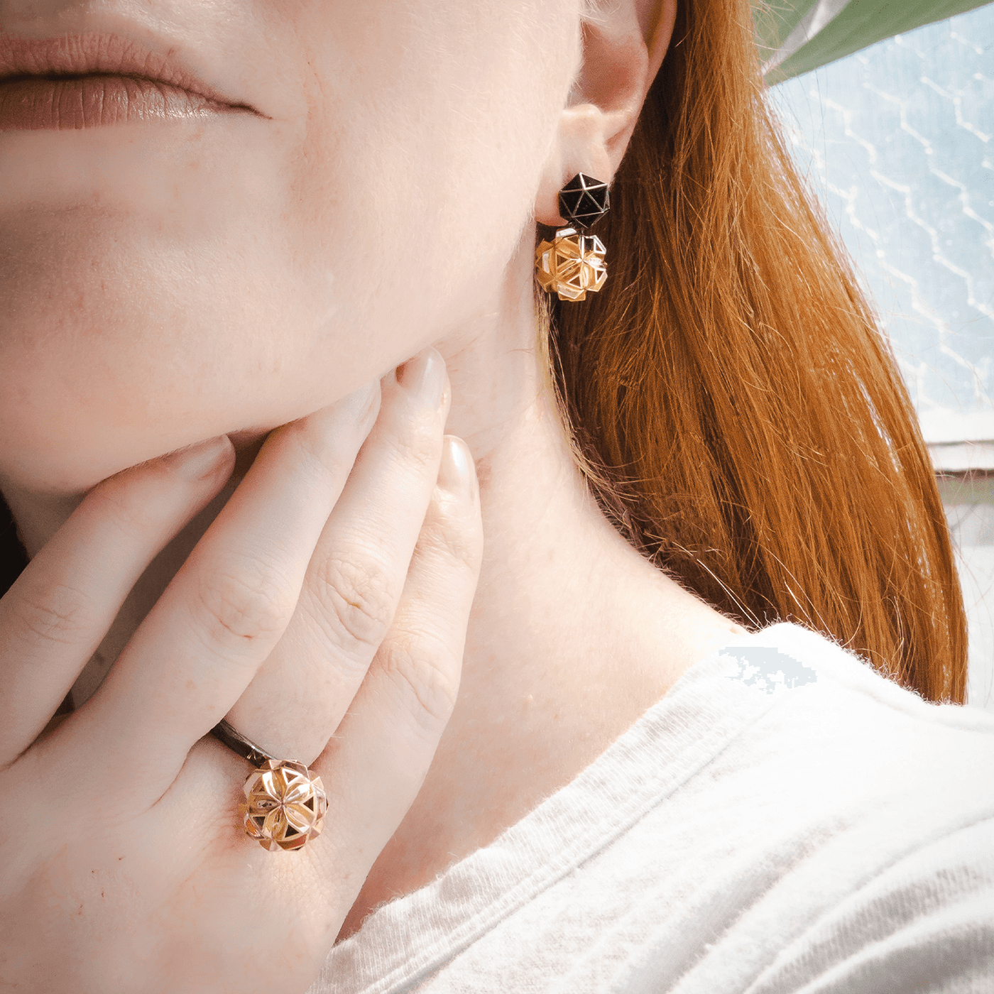 14K yellow gold rings gold earrings rhodium fine jewelry on model