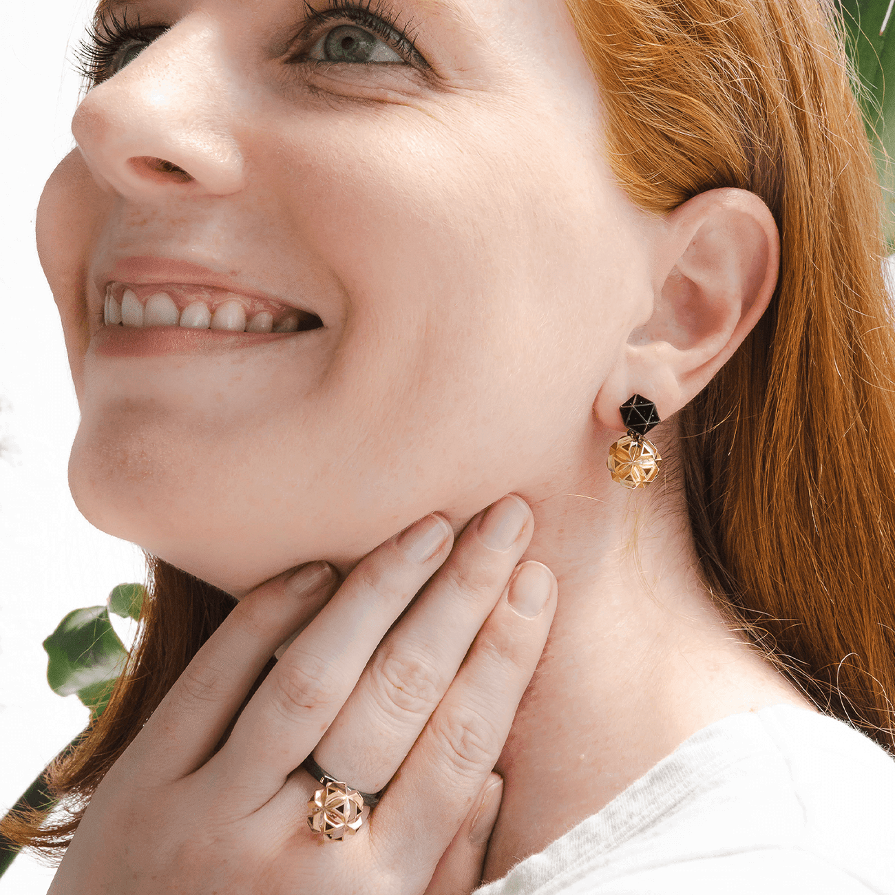 14K yellow gold earrings gold rings rhodium fine jewelry on model